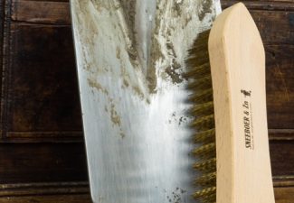 Sneeboer vuile spade + borstel